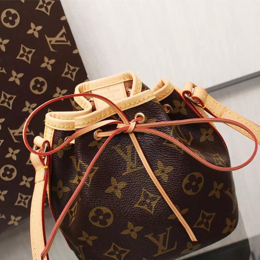 Kate Monogram Top Handle Bag