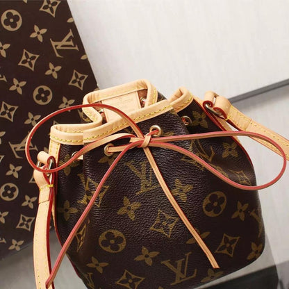 Kate Monogram Top Handle Bag