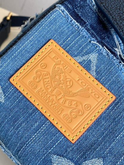 Elegant Refined Monogram Denim Top Handle Bag