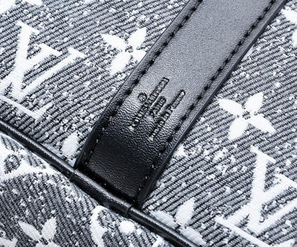 Luxury Refined Monogram Denim Top Handle Bag