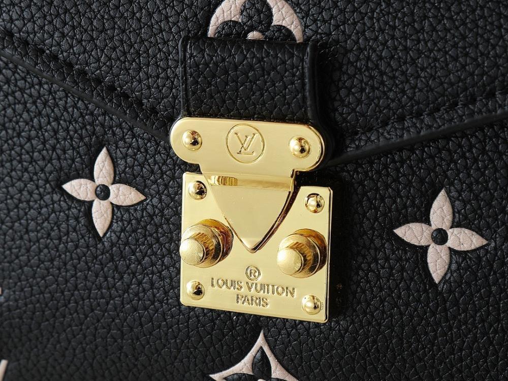 The Pouch Monogram Leather Top Handle Bag