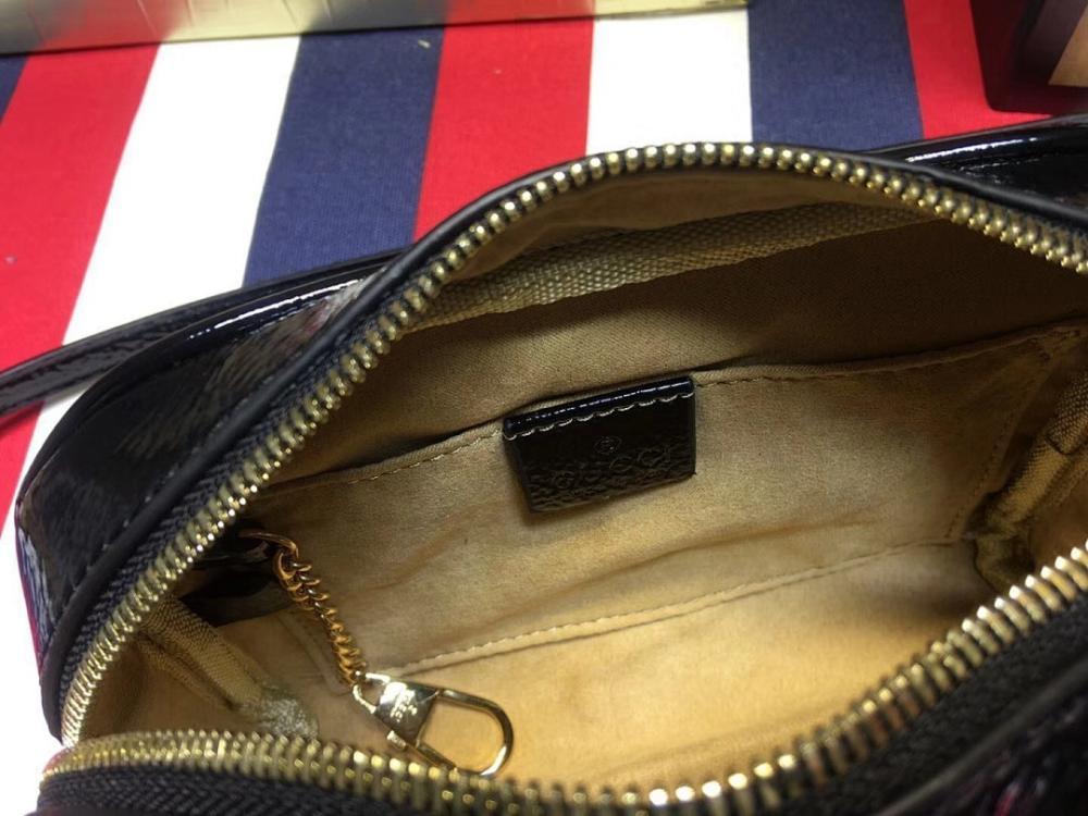 Ophidia Top Handle Bag
