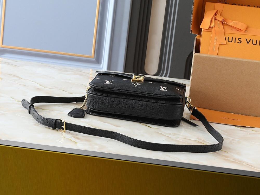 The Pouch Monogram Leather Top Handle Bag