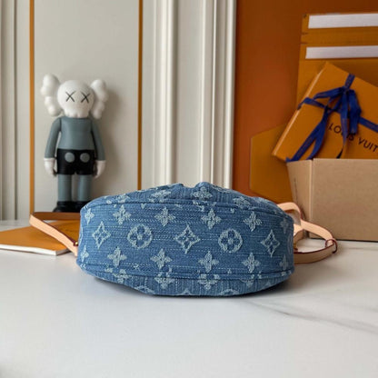 The Pouch Monogram Leather Top Handle Bag
