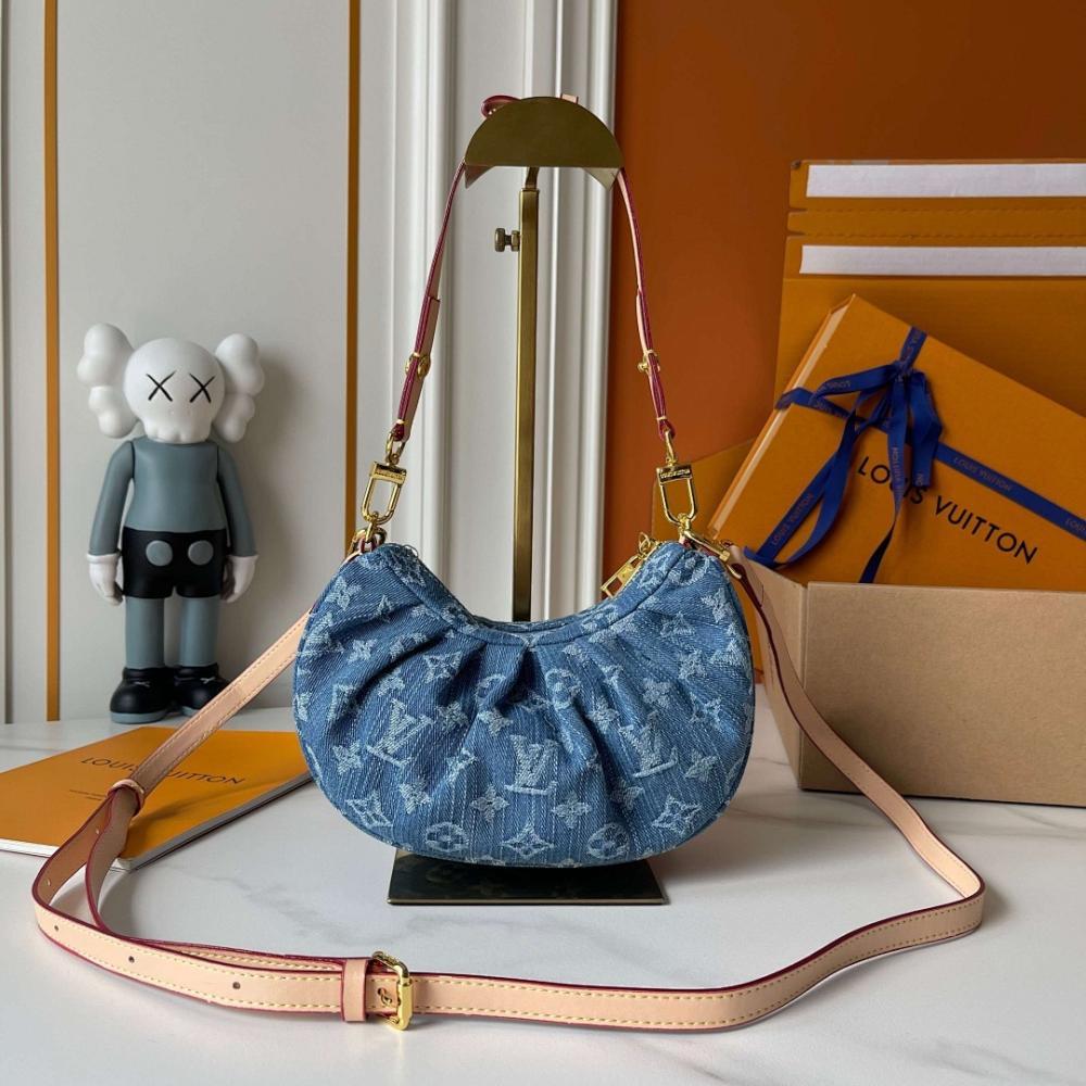 The Pouch Monogram Leather Top Handle Bag