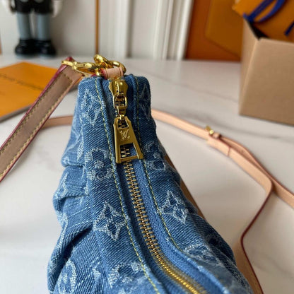 The Pouch Monogram Leather Top Handle Bag