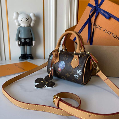 Speedy Monogram Leather Top Handle Bag