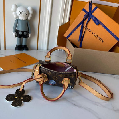 Speedy Monogram Leather Top Handle Bag