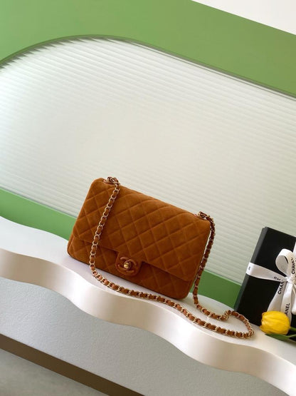 Alma Gold Suede Top Handle Bag