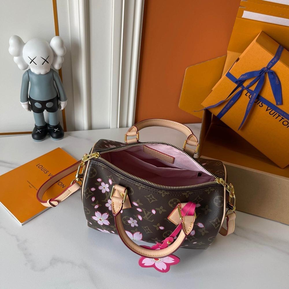 Speedy Monogram Leather Top Handle Bag