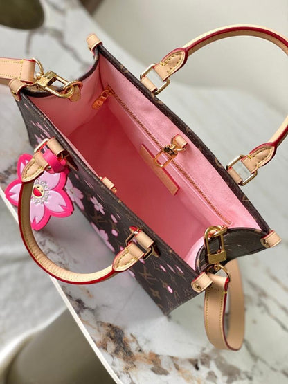OnTheGo Monogram Leather Top Handle Bag