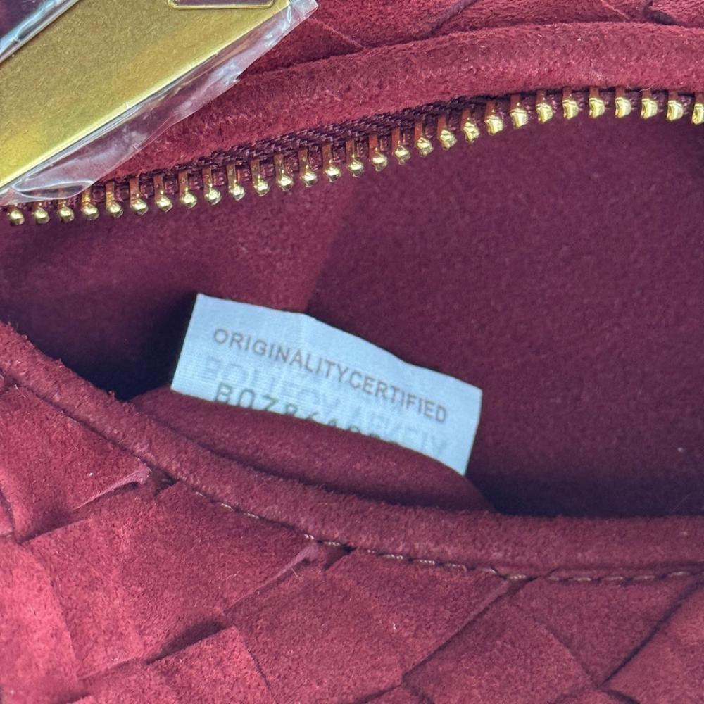 Jodie Woven Leather Top Handle Bag