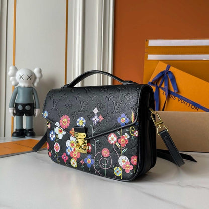 The Pouch Monogram Leather Top Handle Bag