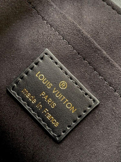 Modern Quilted Leather Top Handle Bag