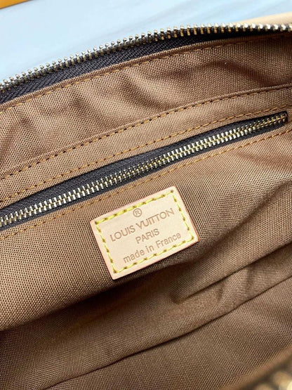 Modern Refined Monogram Leather Top Handle Bag