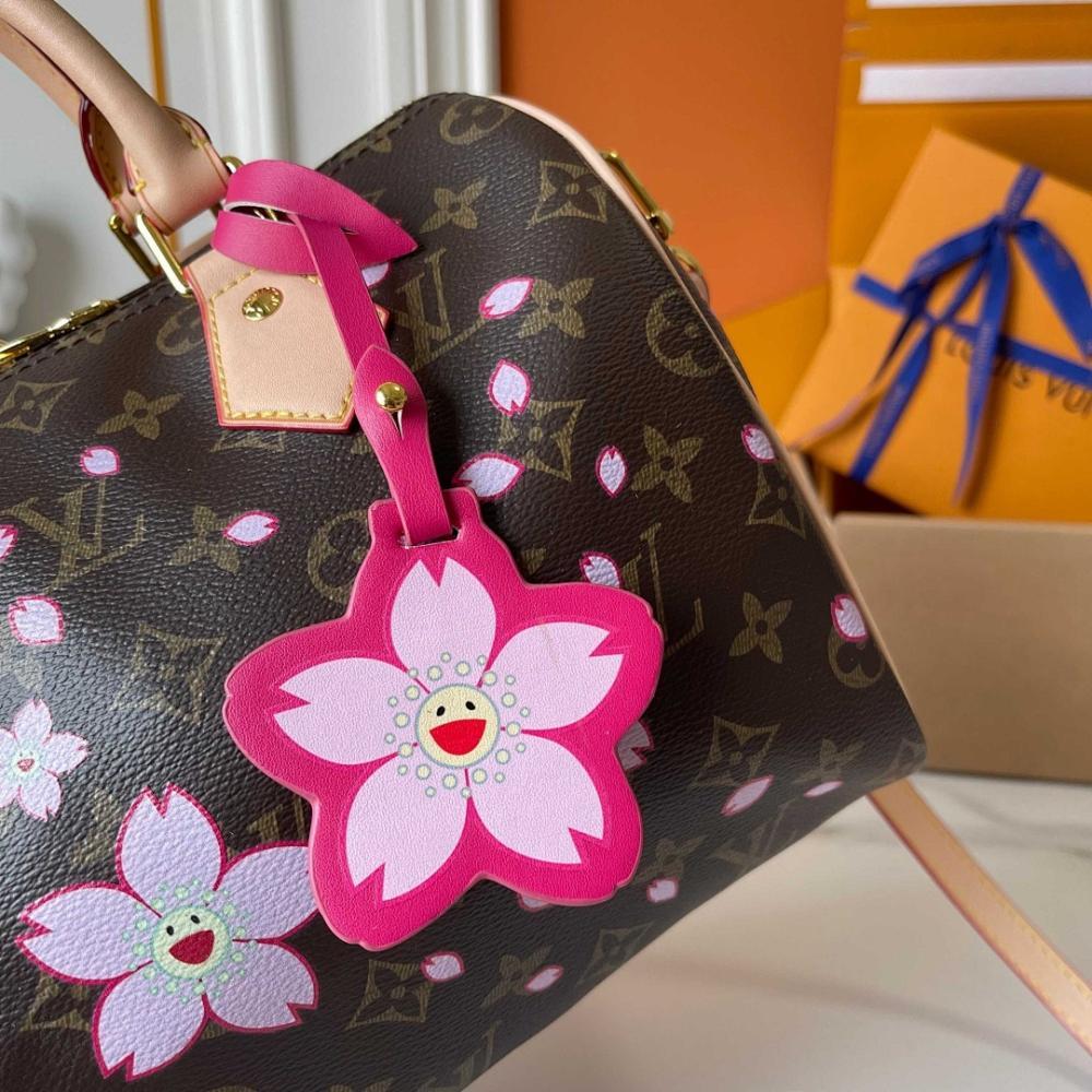 Speedy Monogram Leather Top Handle Bag