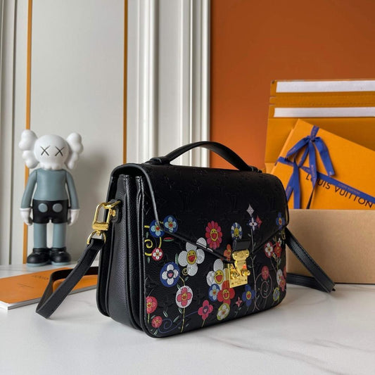 The Pouch Monogram Leather Top Handle Bag