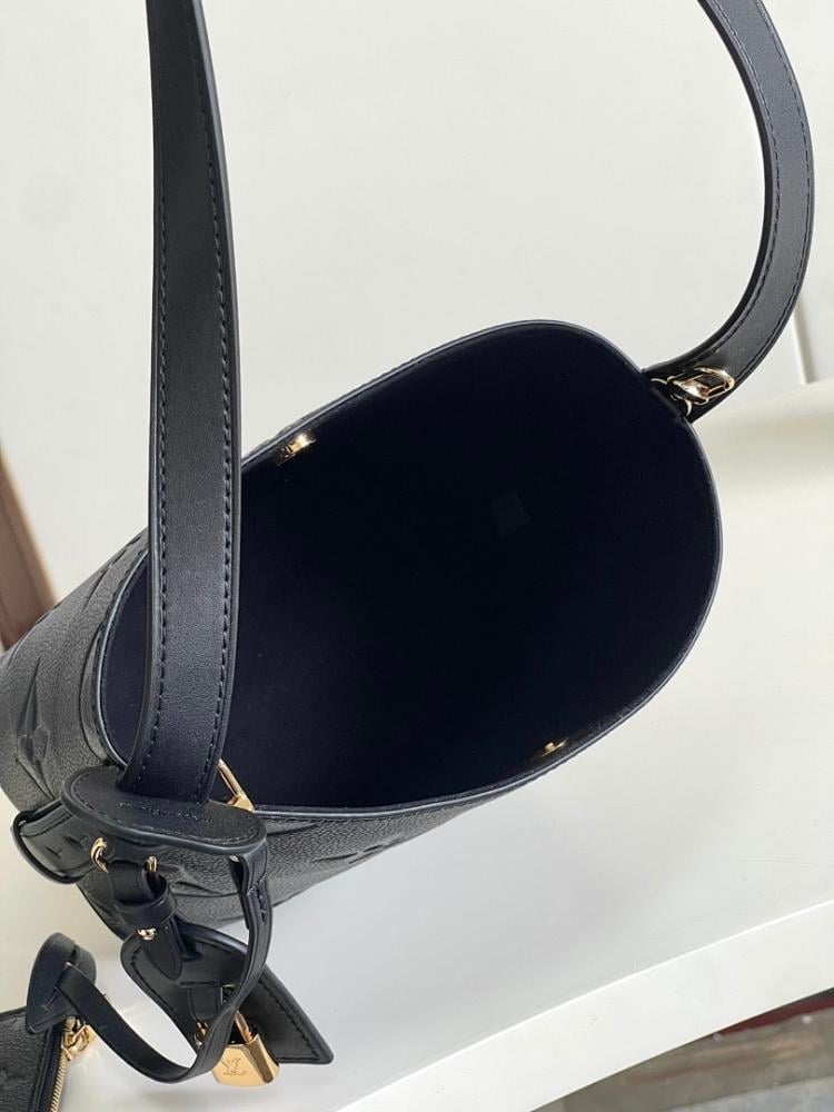 Modern Refined Monogram Leather Bucket Bag