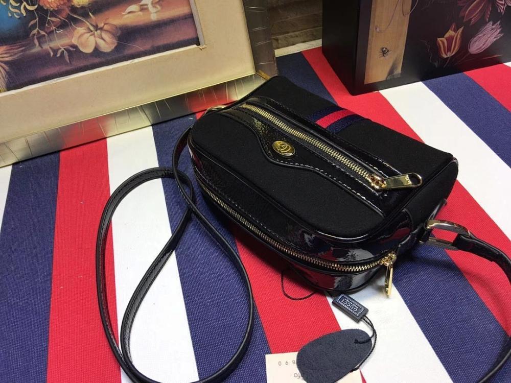 Ophidia Top Handle Bag