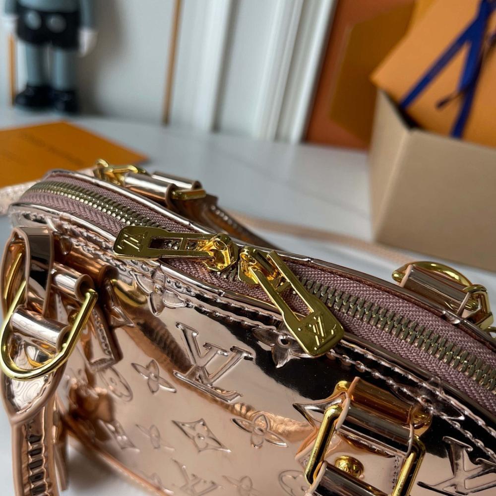 Alma Monogram Travel Bag