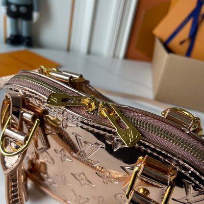 Alma Monogram Travel Bag
