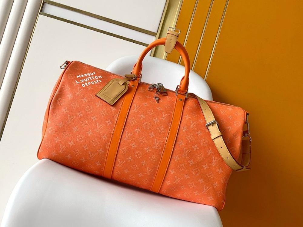 Monogram Leather Travel Bag
