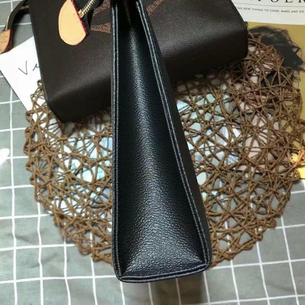 Luxury Elegant Monogram Canvas Top Handle Bag – Limited Edition
