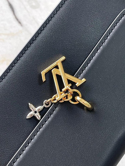 Elegant Monogram Leather Top Handle Bag – Special Edition