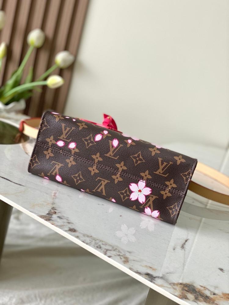 OnTheGo Monogram Leather Top Handle Bag