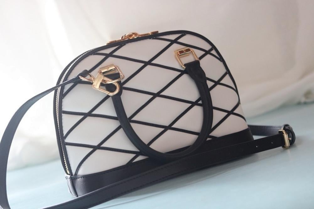 Alma Quilted Lambskin Travel Bag