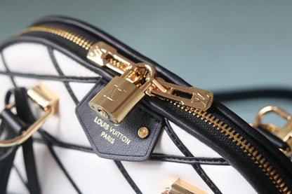 Alma Quilted Lambskin Travel Bag