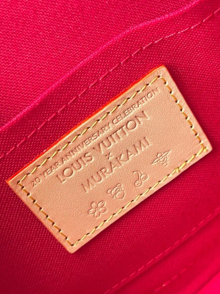 Alma Monogram Leather Top Handle Bag
