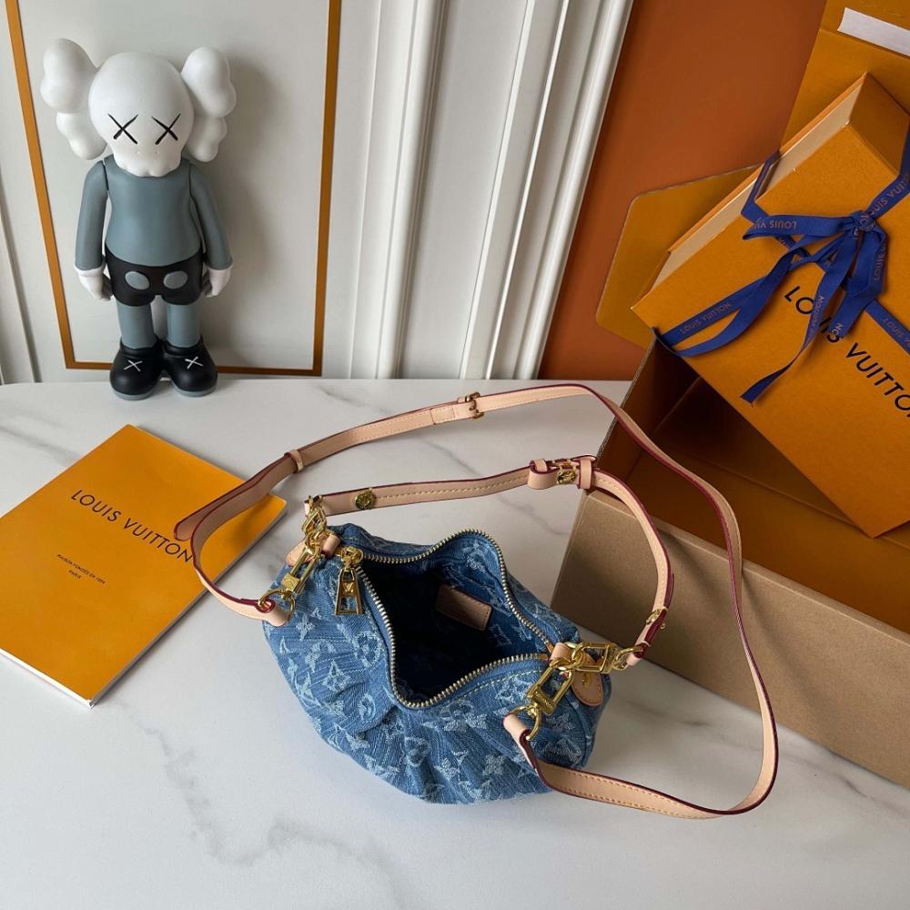 The Pouch Monogram Leather Top Handle Bag
