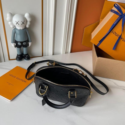 Alma Gold Monogram Leather Bucket Bag