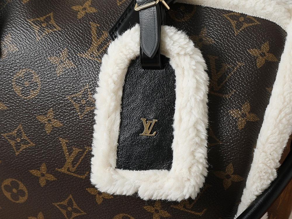 Elegant Refined Monogram Lambskin Top Handle Bag