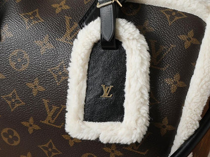 Elegant Refined Monogram Lambskin Top Handle Bag