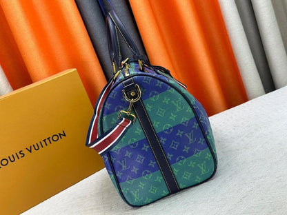 Alma Monogram Leather Shoulder Bag