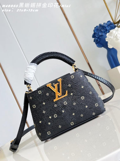Capucines Leather Top Handle Bag