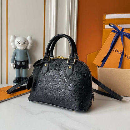 Alma Gold Monogram Leather Bucket Bag